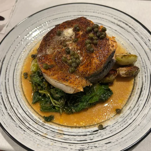 Blackened salmon steak main course